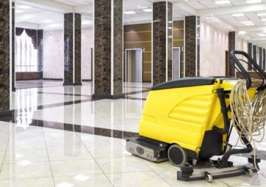Cleaning,Machine,In,Empty,Office,Lobby,,Yellow,Vacuum,Equipment,Is