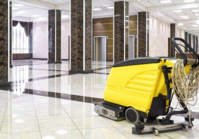 Cleaning,Machine,In,Empty,Office,Lobby,,Yellow,Vacuum,Equipment,Is